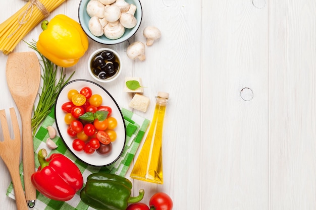 Colorful kitchen table with ingredients